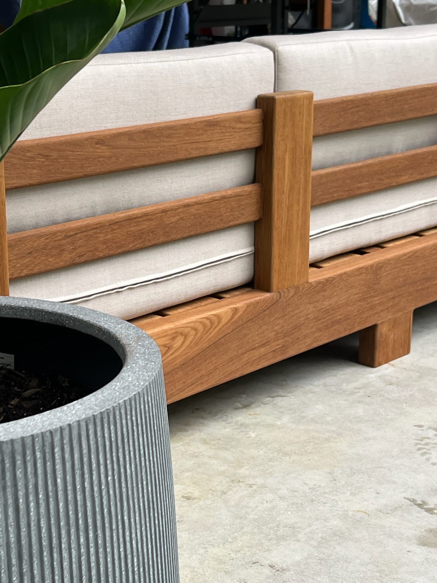 Teak slatted outdoor sofa