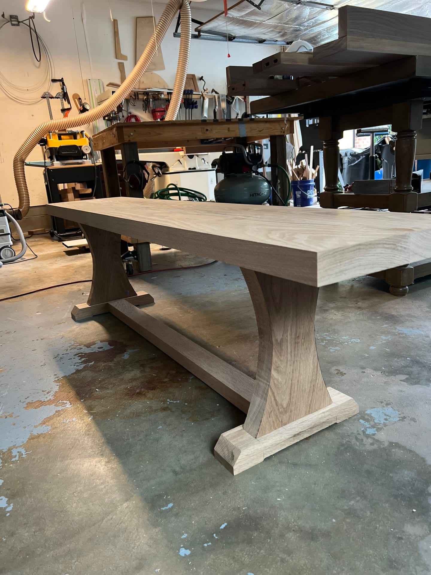 White oak trestle bench