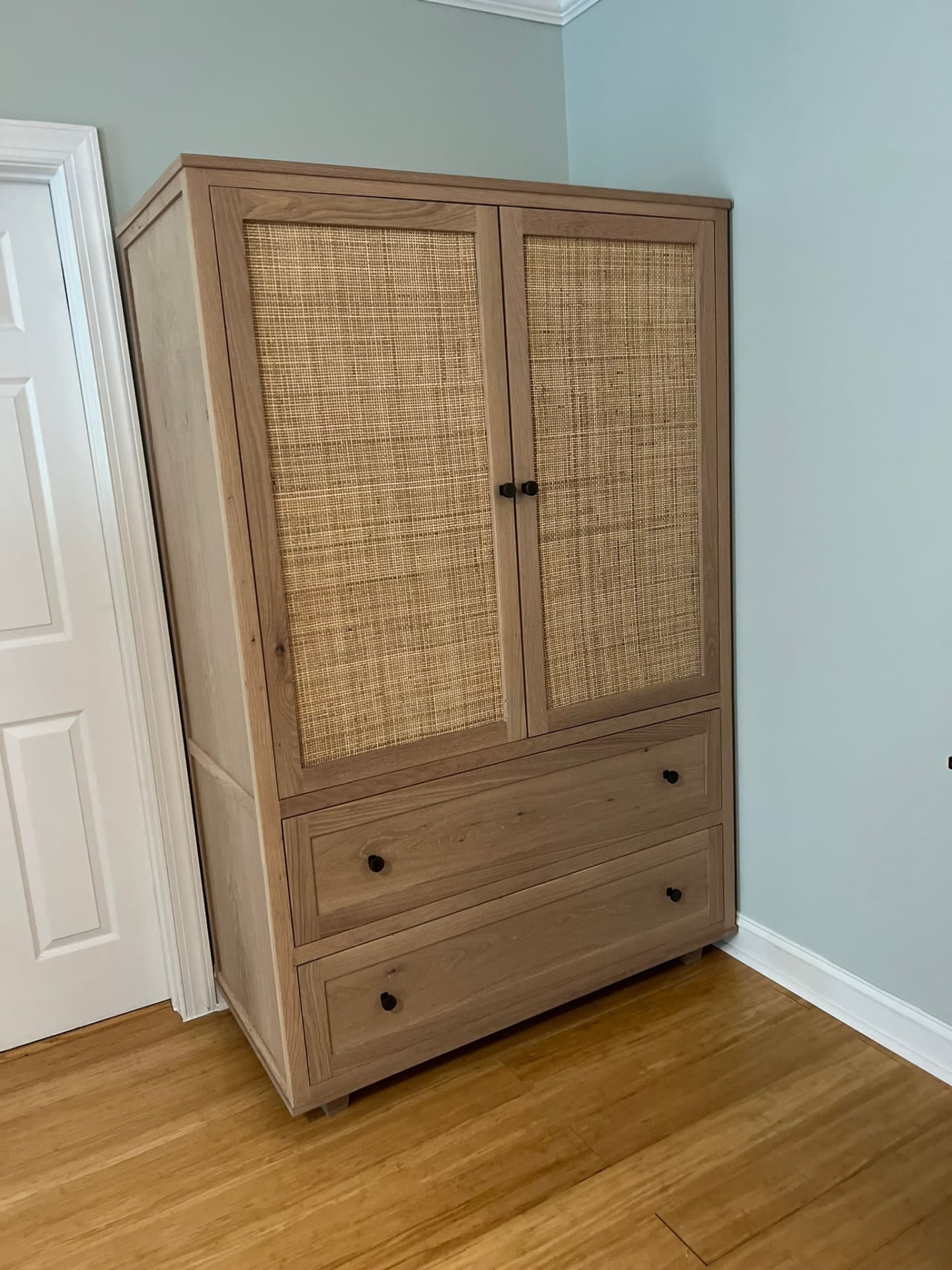 White oak cane armoire