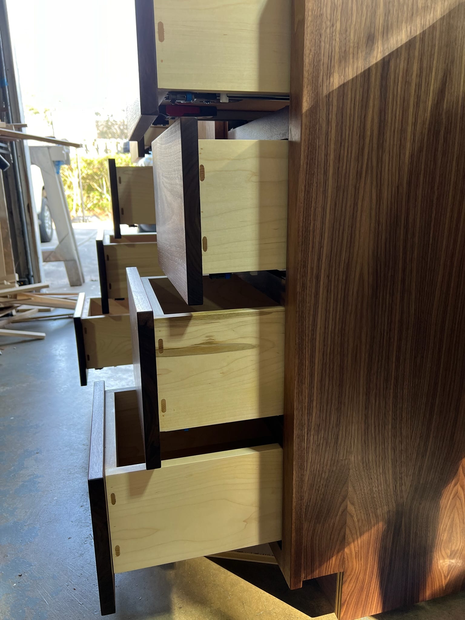 Walnut & maple chest of drawers