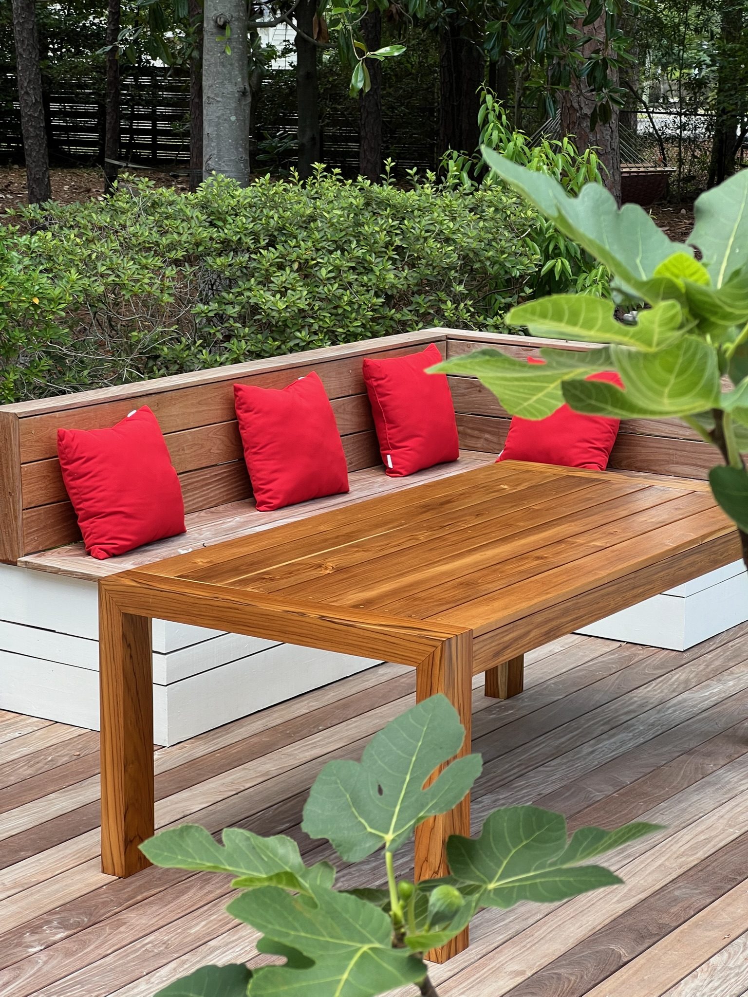 Teak slatted outdoor dining table