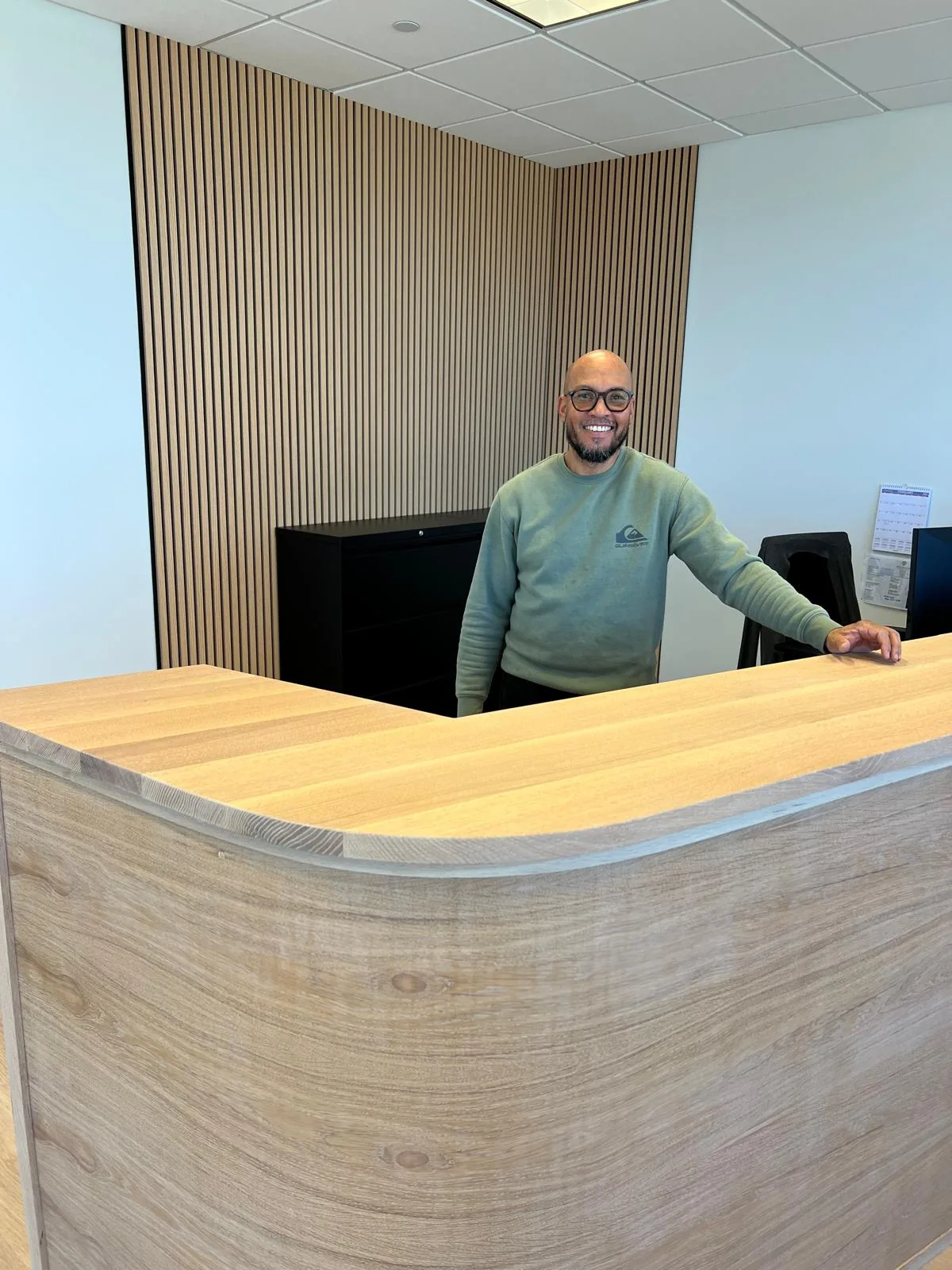 Curved white oak desk
